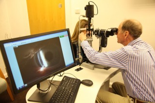 Ophthalmologist Dr Doyle consulting on laser eye surgery